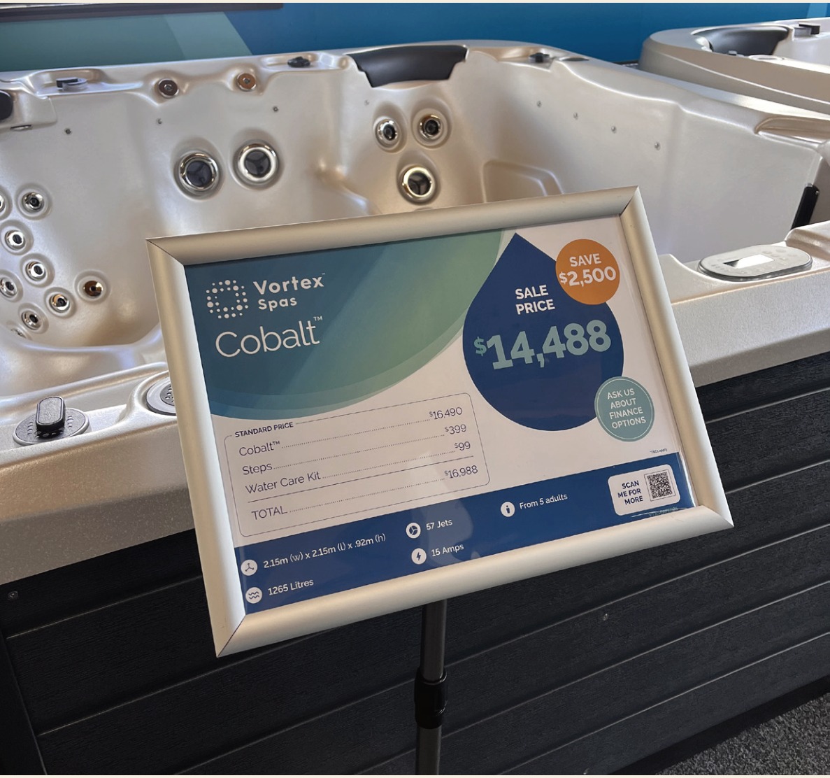In-store price card displayed on a spa unit at Spa World